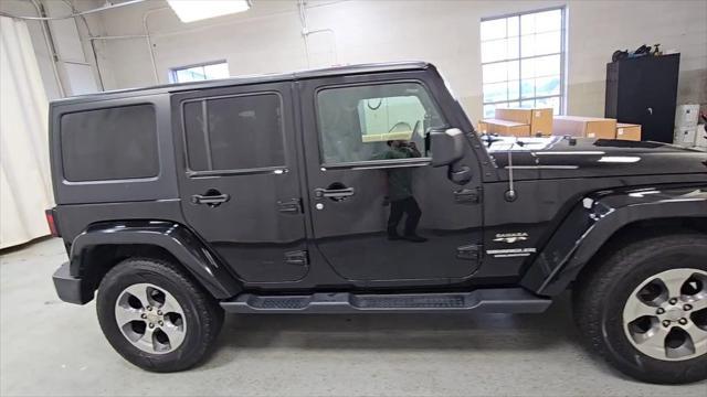 used 2016 Jeep Wrangler Unlimited car, priced at $13,813