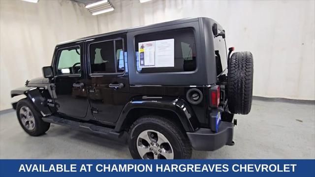 used 2016 Jeep Wrangler Unlimited car, priced at $13,089