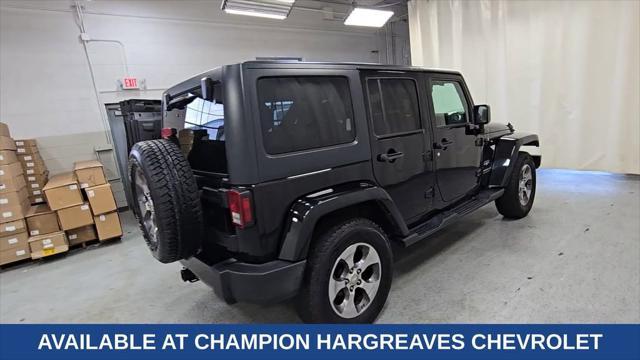 used 2016 Jeep Wrangler Unlimited car, priced at $13,089