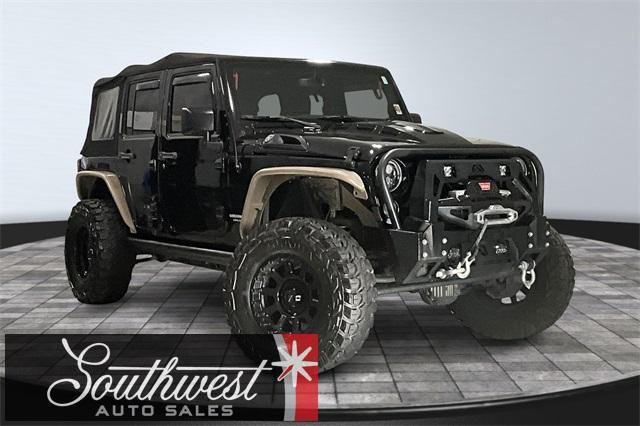 used 2016 Jeep Wrangler Unlimited car, priced at $23,207