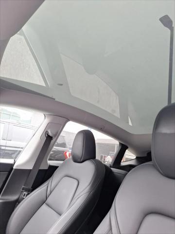 used 2023 Tesla Model Y car, priced at $27,991
