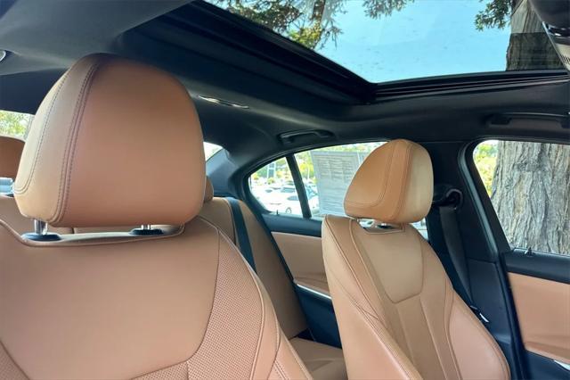 used 2022 BMW 330e car, priced at $30,990