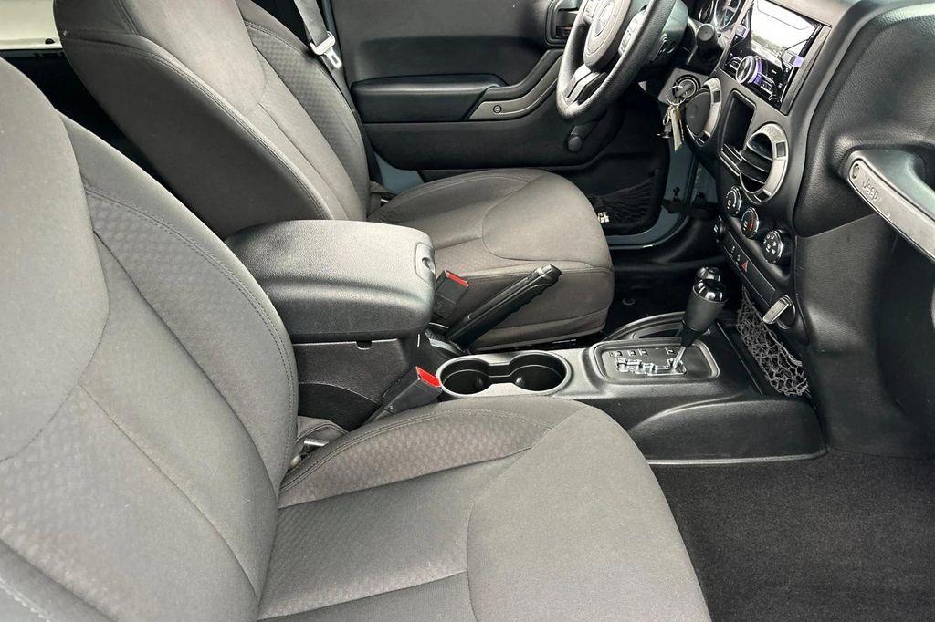 used 2015 Jeep Wrangler car, priced at $16,991