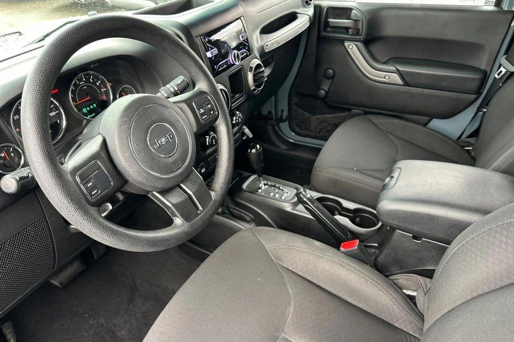 used 2015 Jeep Wrangler car, priced at $16,991