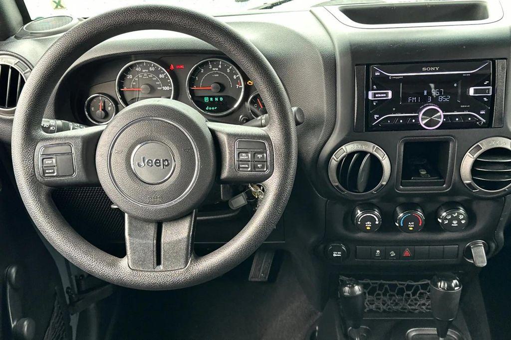 used 2015 Jeep Wrangler car, priced at $16,991