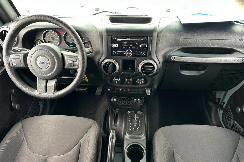 used 2015 Jeep Wrangler car, priced at $16,991