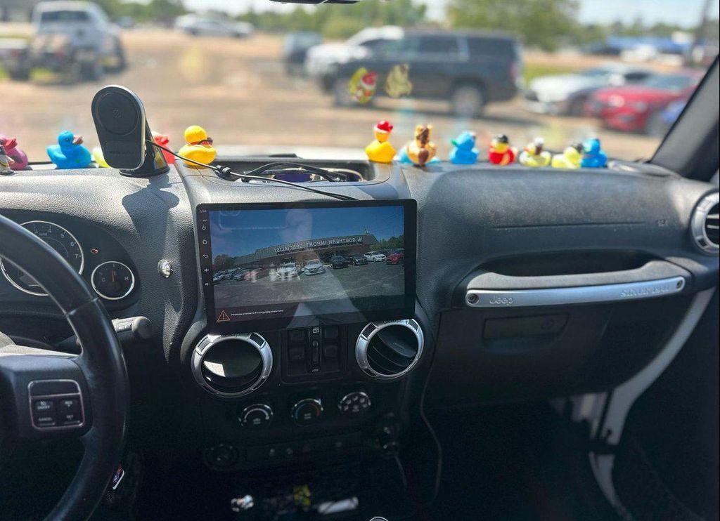 used 2015 Jeep Wrangler Unlimited car, priced at $29,950