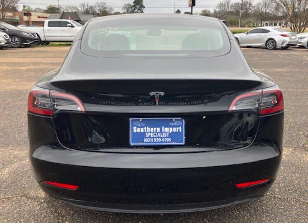 used 2023 Tesla Model 3 car, priced at $39,950