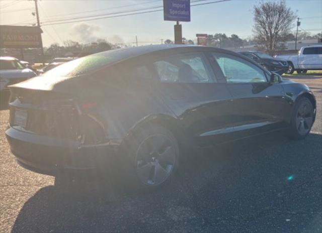 used 2023 Tesla Model 3 car, priced at $39,950