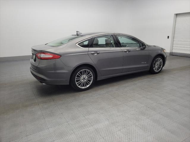 used 2014 Ford Fusion Hybrid car, priced at $12,595