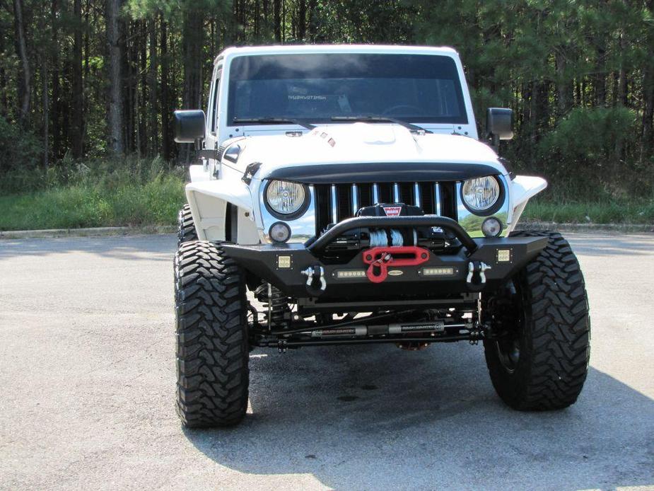 used 2016 Jeep Wrangler Unlimited car, priced at $25,945