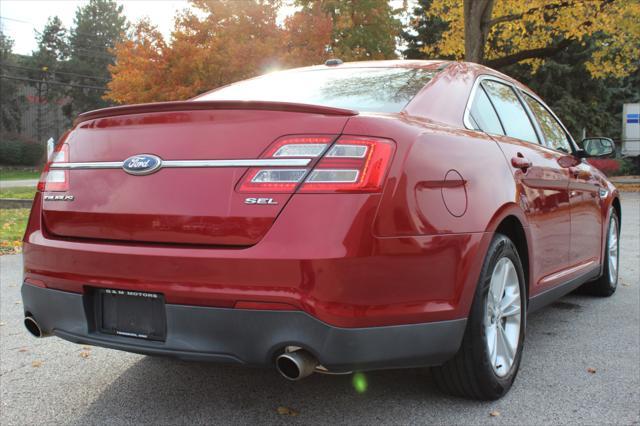 used 2013 Ford Taurus car, priced at $4,950