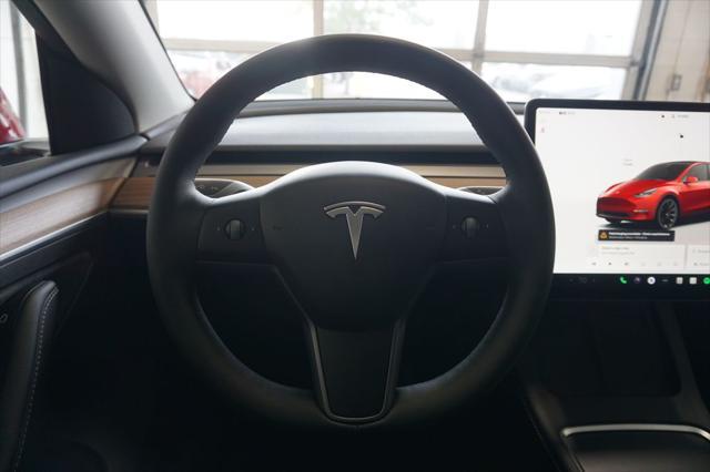 used 2023 Tesla Model Y car, priced at $34,229