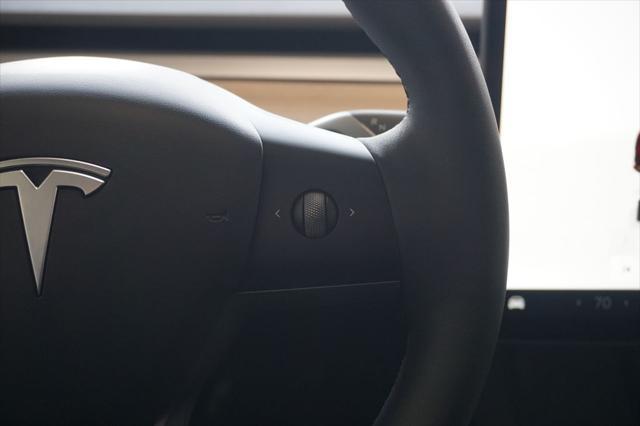 used 2023 Tesla Model Y car, priced at $34,229