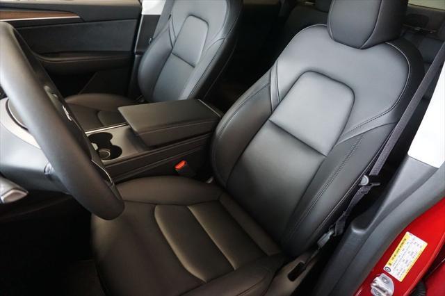 used 2023 Tesla Model Y car, priced at $34,229