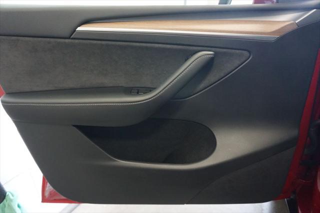 used 2023 Tesla Model Y car, priced at $34,229