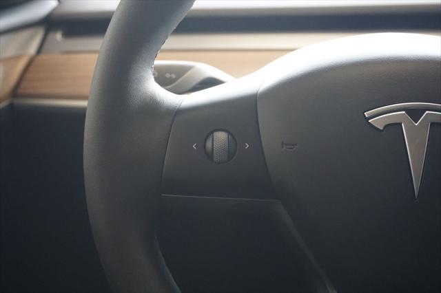 used 2023 Tesla Model Y car, priced at $34,229