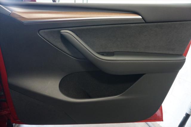 used 2023 Tesla Model Y car, priced at $34,229