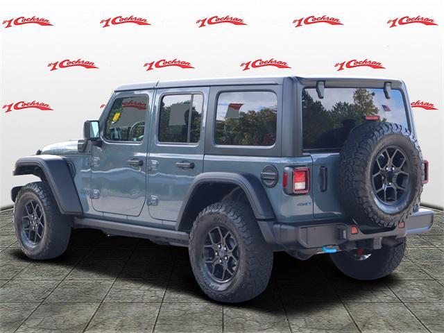 used 2024 Jeep Wrangler 4xe car, priced at $36,873