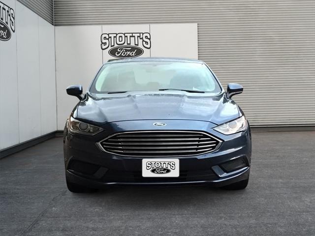 used 2018 Ford Fusion car, priced at $11,990