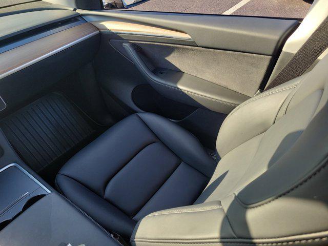 used 2023 Tesla Model Y car, priced at $25,789