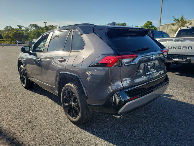 used 2023 Toyota RAV4 Hybrid car, priced at $32,487