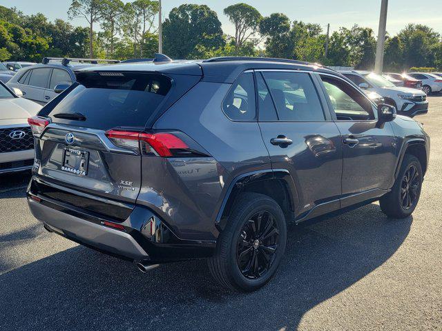used 2023 Toyota RAV4 Hybrid car, priced at $32,487