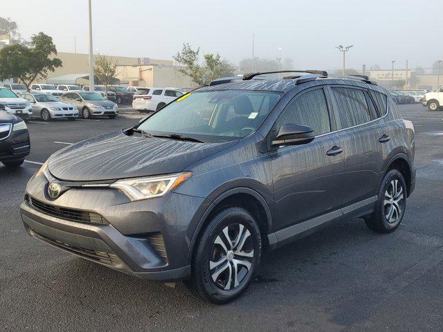 used 2018 Toyota RAV4 car, priced at $13,995