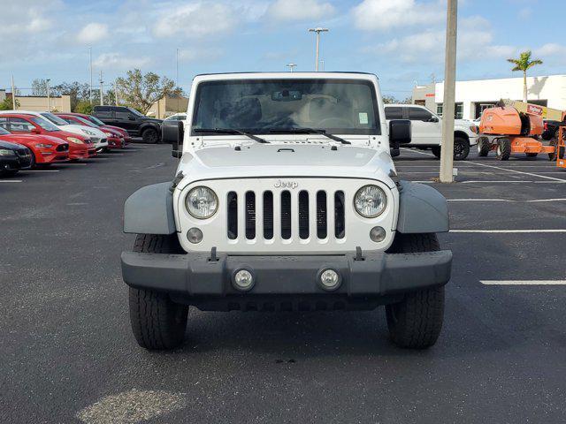 used 2015 Jeep Wrangler Unlimited car, priced at $17,398