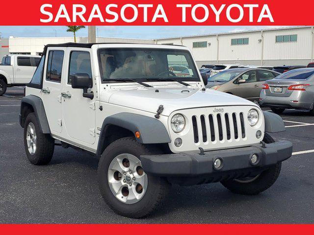 used 2015 Jeep Wrangler Unlimited car, priced at $17,398