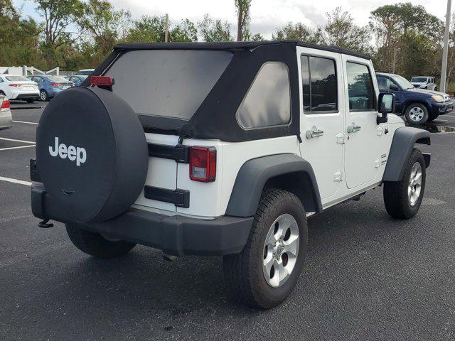 used 2015 Jeep Wrangler Unlimited car, priced at $17,398