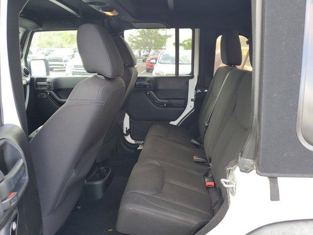 used 2015 Jeep Wrangler Unlimited car, priced at $17,398