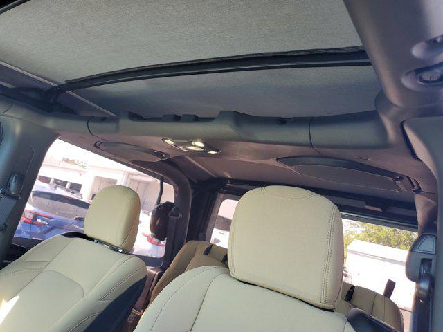 used 2023 Jeep Wrangler car, priced at $23,997
