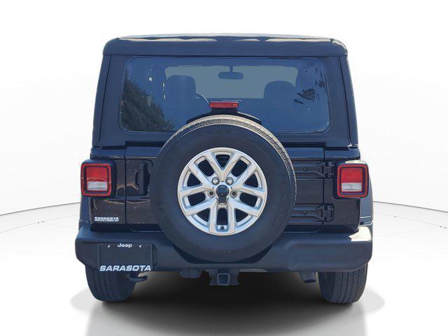 used 2023 Jeep Wrangler car, priced at $23,997