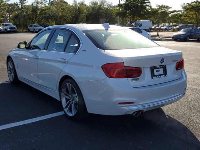 used 2018 BMW 330e car, priced at $15,149