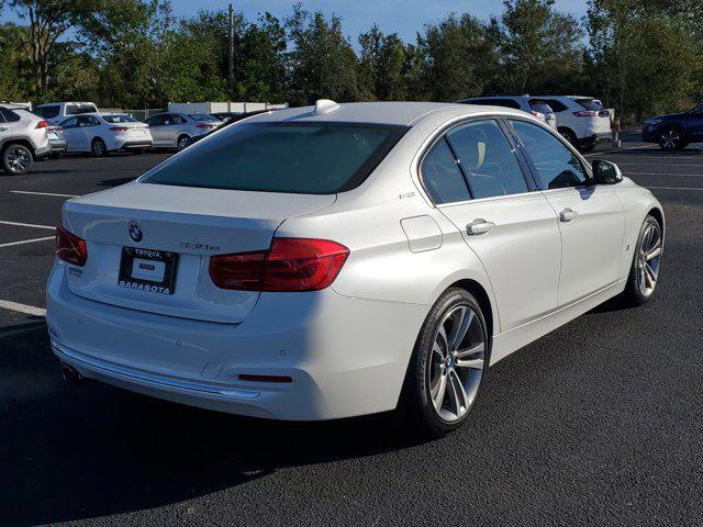 used 2018 BMW 330e car, priced at $15,149