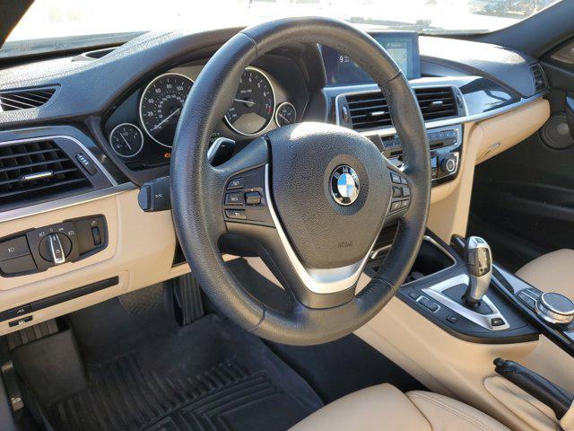 used 2018 BMW 330e car, priced at $15,149