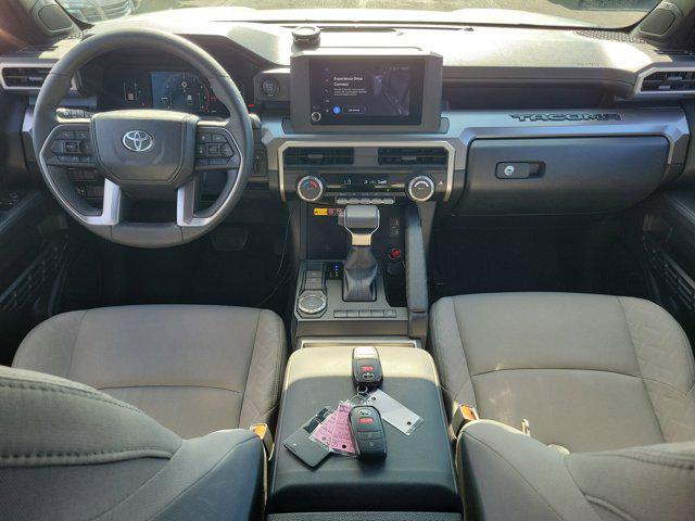 used 2024 Toyota Tacoma car, priced at $31,990