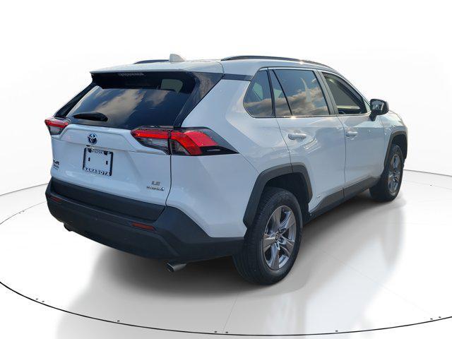 used 2024 Toyota RAV4 Hybrid car, priced at $29,899