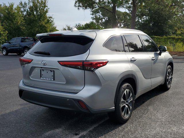 used 2021 Toyota Highlander car, priced at $30,498