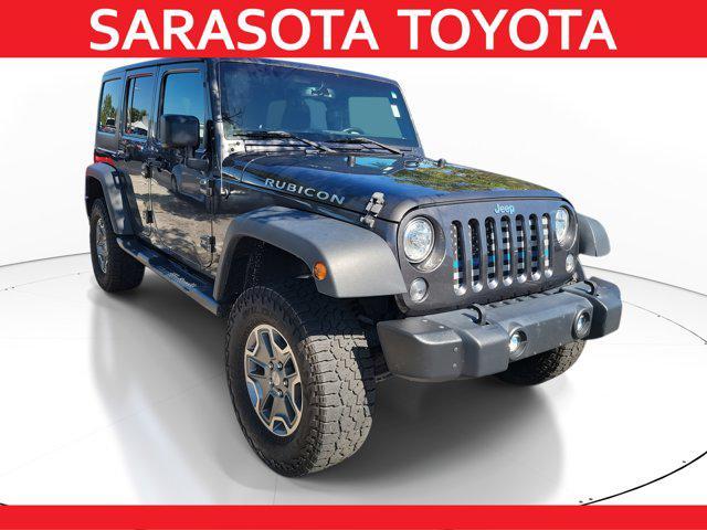 used 2018 Jeep Wrangler JK Unlimited car, priced at $23,499