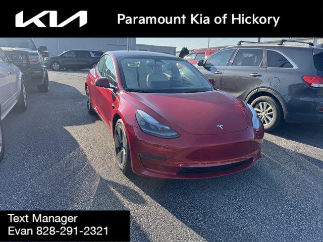 used 2023 Tesla Model 3 car, priced at $23,548