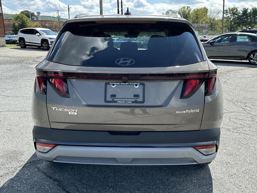 new 2025 Hyundai TUCSON Hybrid car, priced at $35,157