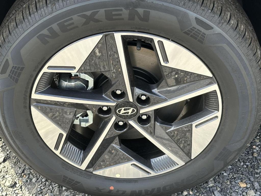 new 2025 Hyundai TUCSON Hybrid car, priced at $38,215