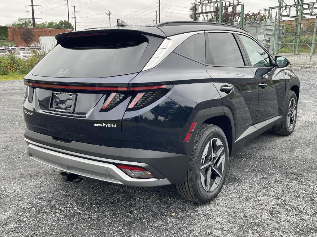 new 2025 Hyundai TUCSON Hybrid car, priced at $38,014