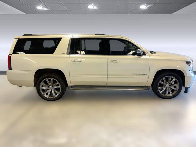 used 2015 Chevrolet Suburban car, priced at $9,999