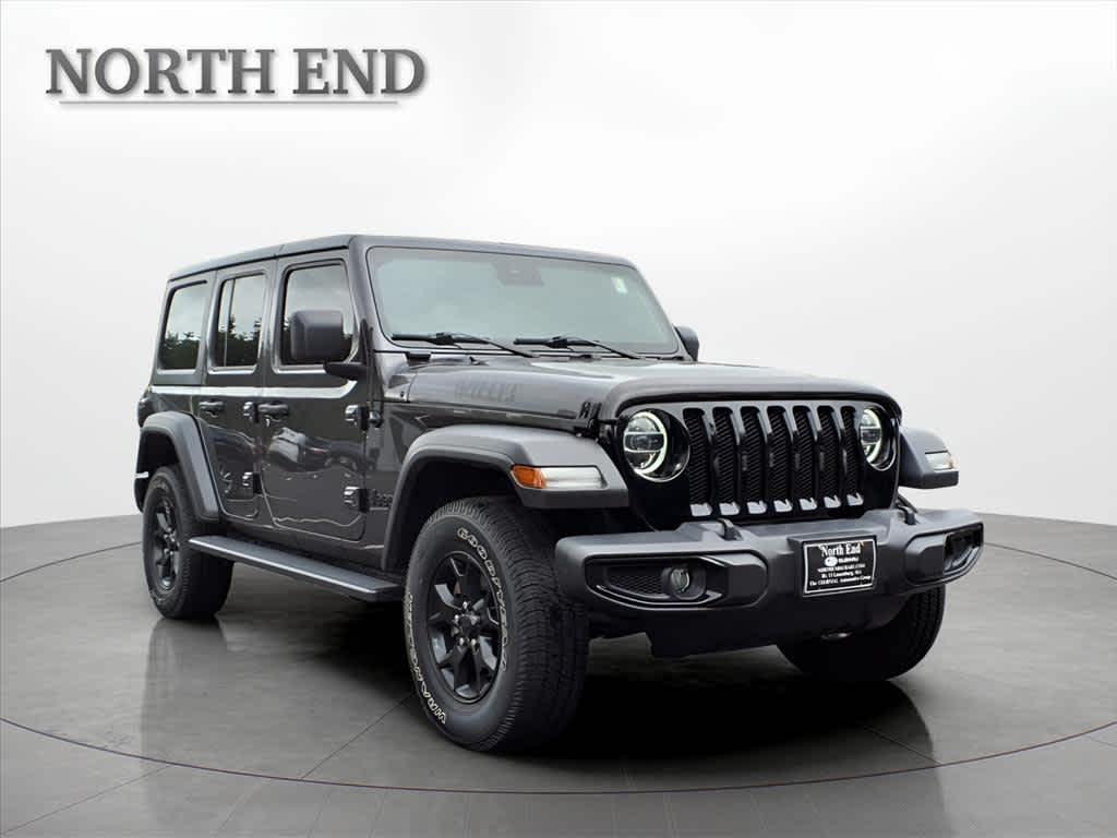 used 2021 Jeep Wrangler Unlimited car, priced at $32,972