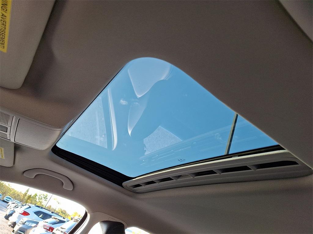 used 2021 Volkswagen Passat car, priced at $18,000