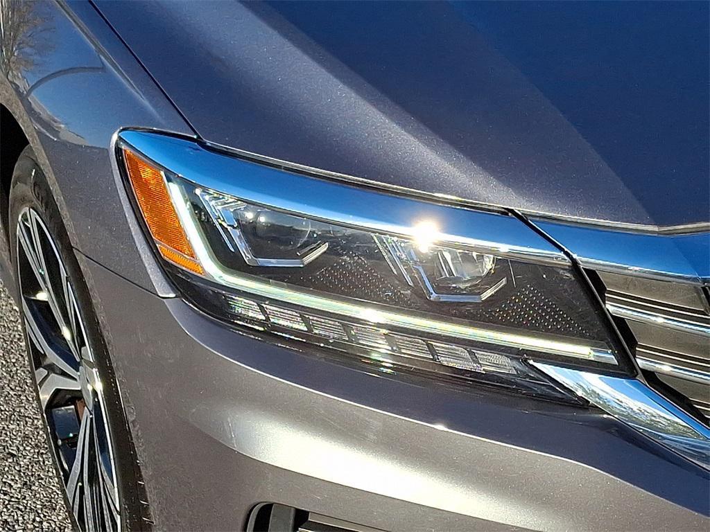 used 2021 Volkswagen Passat car, priced at $18,000
