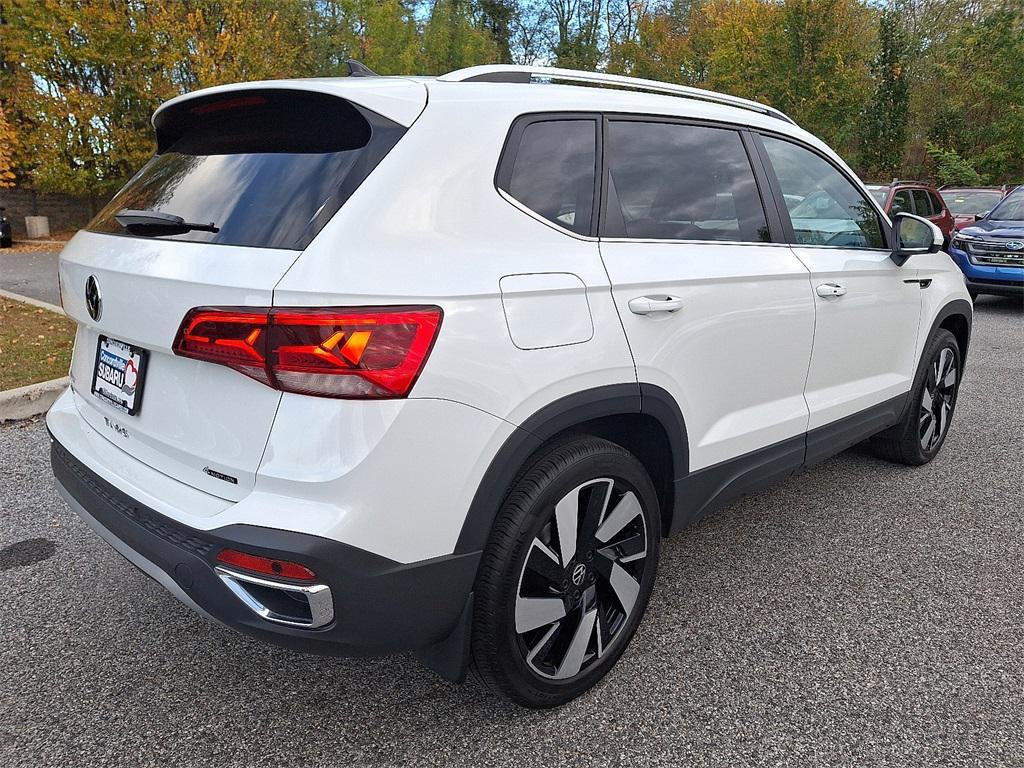 used 2024 Volkswagen Taos car, priced at $26,000